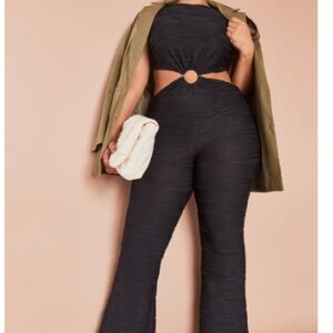 Plus Black Textured Ring Jumpsuit from Pretty little thing.